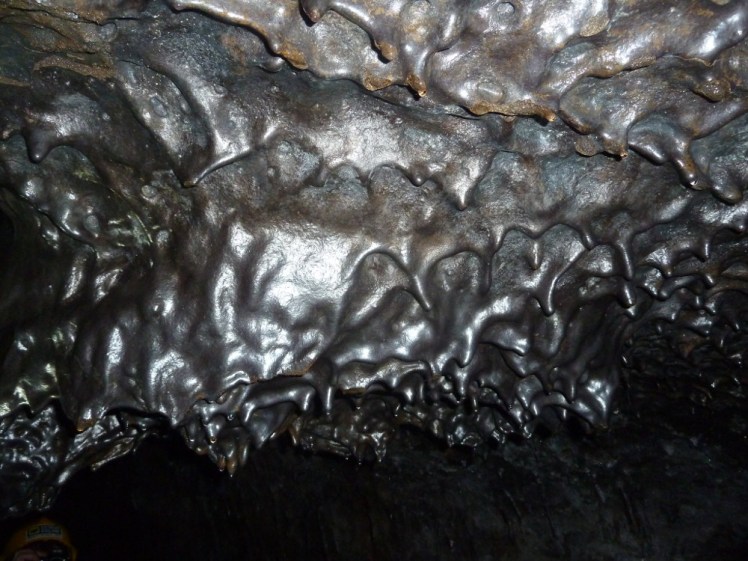 Gleaming metallic rock inside the cave