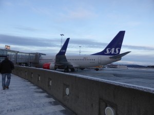 Disembarking at Tromsø Airport for pre-Svalbard passport control. It's getting dark and it's faintly snowy as we walk back to the plane after all the admin.