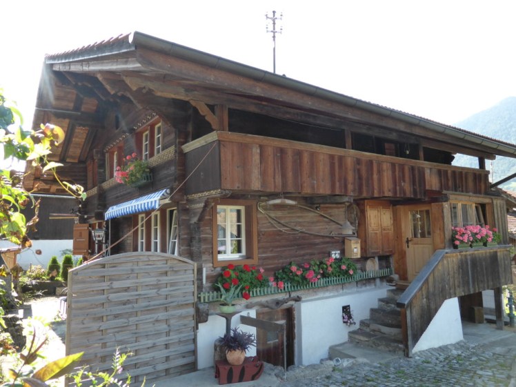 An older, more traditional chalet with less decoration but just as many balconies.