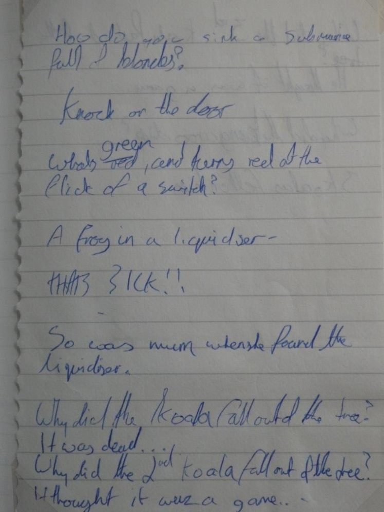 A page of lined paper torn from an A6 notebook. Chris has written some jokes on it in blue pen with terrible handwriting.