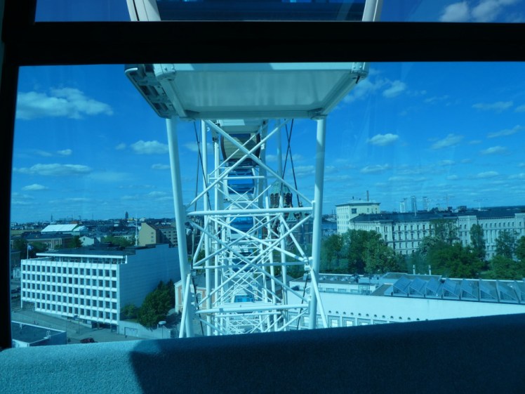 Looking through the structure of the wheel as we approach the very top.