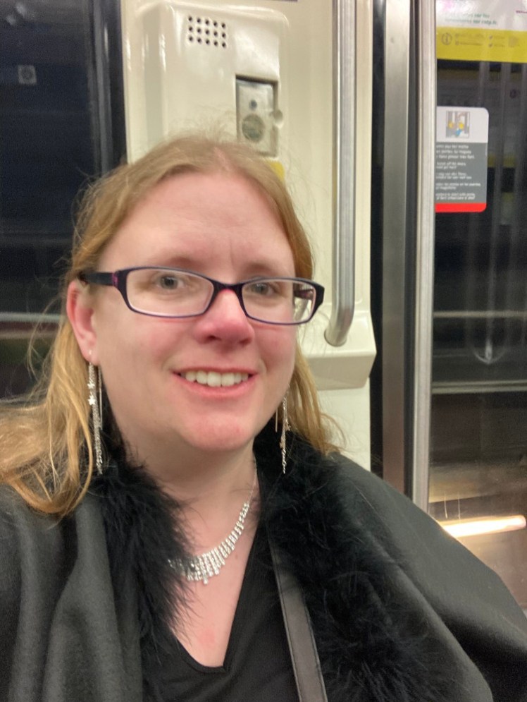 A selfie on the Paris metro, a bit overdressed in fur cloak and lots of silver jewellery (I'm on my way home from the opera).