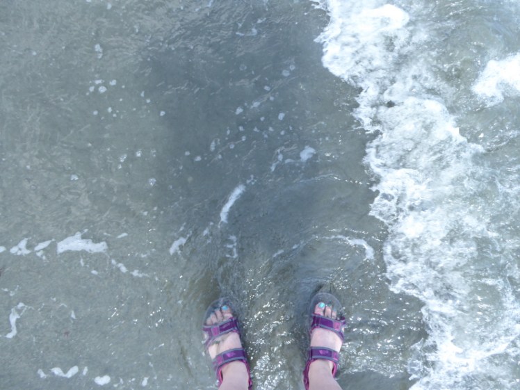 Waterproof mountain sandals in the sea