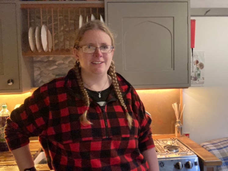 In the kitchen in my red checked fleece. You can just make out my Dua Lipa t-shirt underneath.