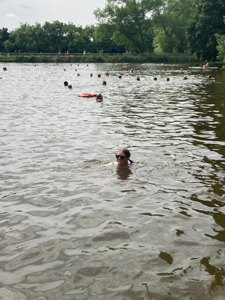 Me swimming in the pond. I'm looking off to the side because I'm trying not to deliberately pose for the camera. The water looks quite brown from this angle.