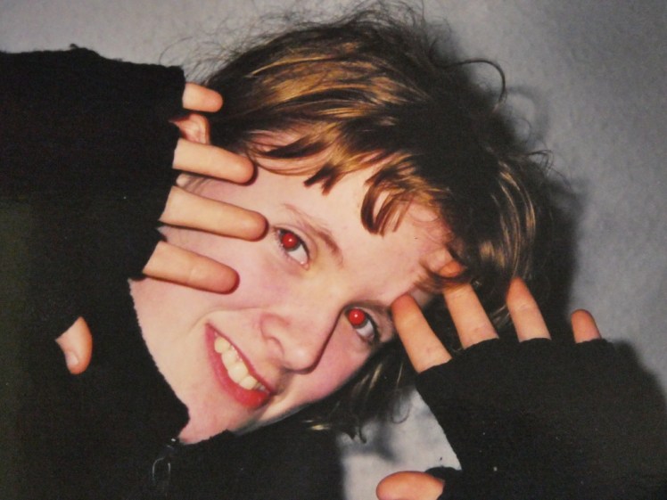 Red-eyed me in Italy on my first solo travel adventure aged 14