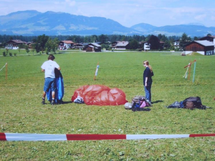 Paragliding - packing up the parachute