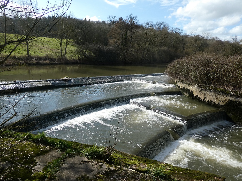 Fish ladder in the river by the mill