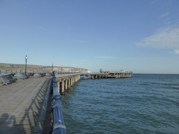 Swanage Pier - a rather austere wooden pier with no amusements, quite low, and