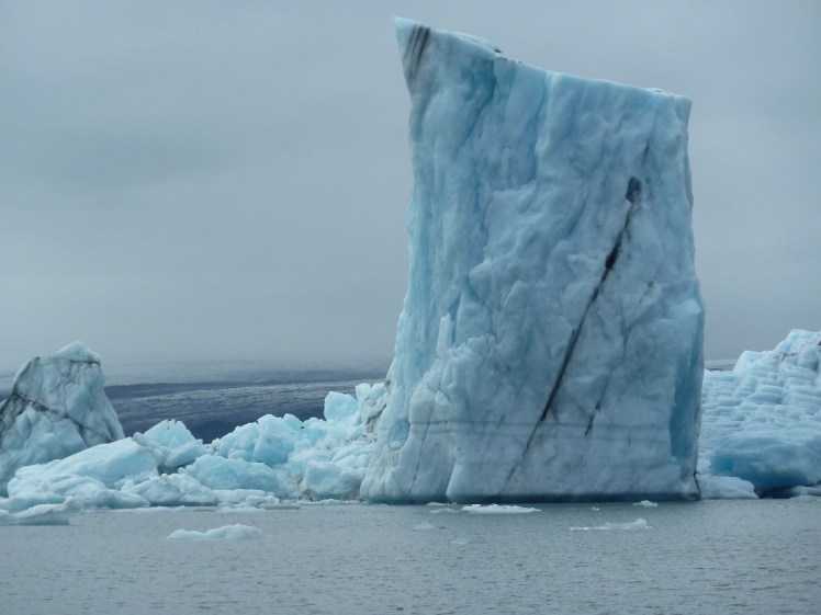 Tall oblong-shaped very unstable-looking iceberg at Jökulsárlón