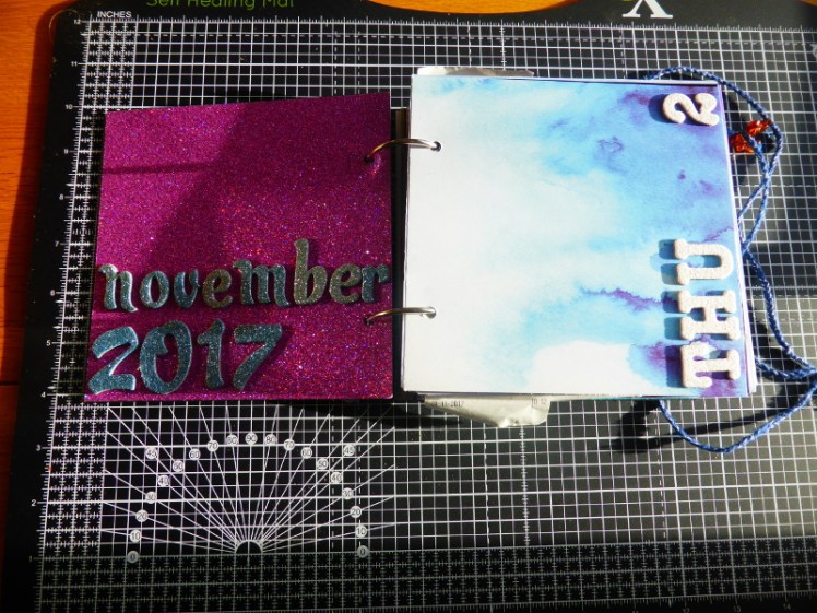 Inside front cover of travel scrapbook