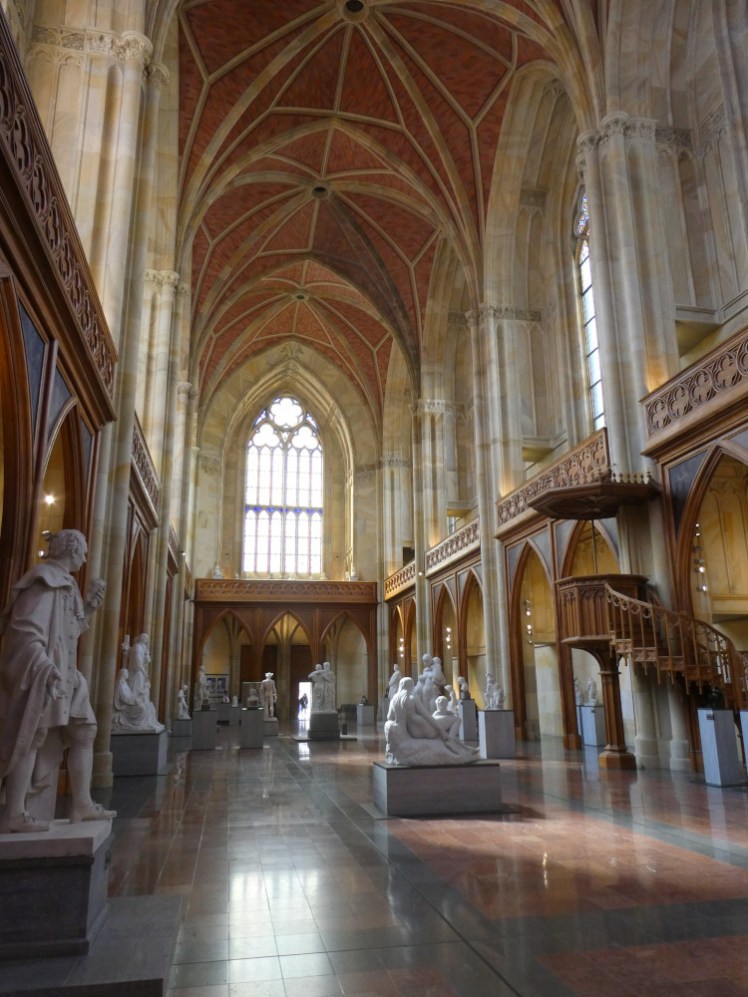 Inside, the church is much lighter, all buttery yellows and orangey reds, with slim pillars and a vaulted ceiling.
