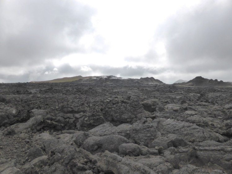 A big black rubbly lava field under another heavy cloudy sky. This one is more than 40 years old but still steaming gently in places.