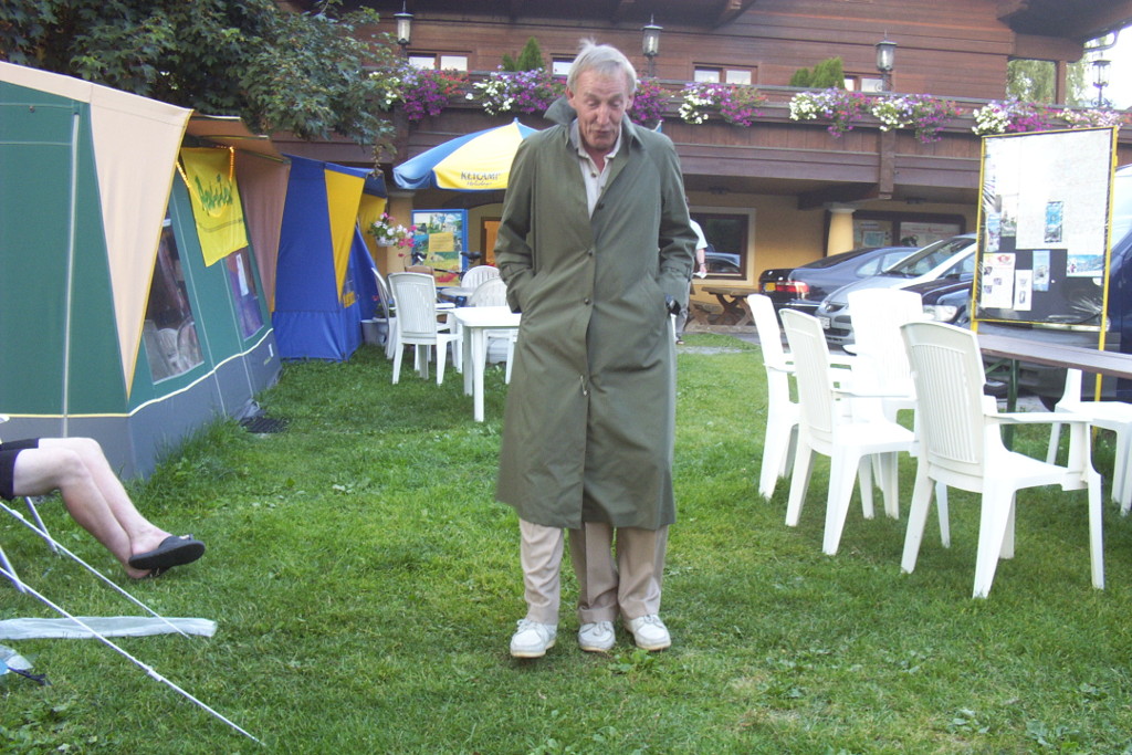 Keycamp courier Harry doing Jake the Peg, wearing a long coat to disguise the attachment of an extra fake leg. This is one of his party pieces; the other being dressing in Austrian dress and playing the accordion.