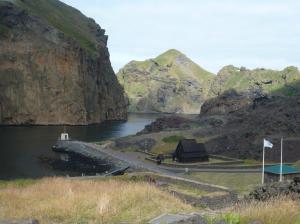 The small Norwegian stave church at the mouth of Heimaey Harbour