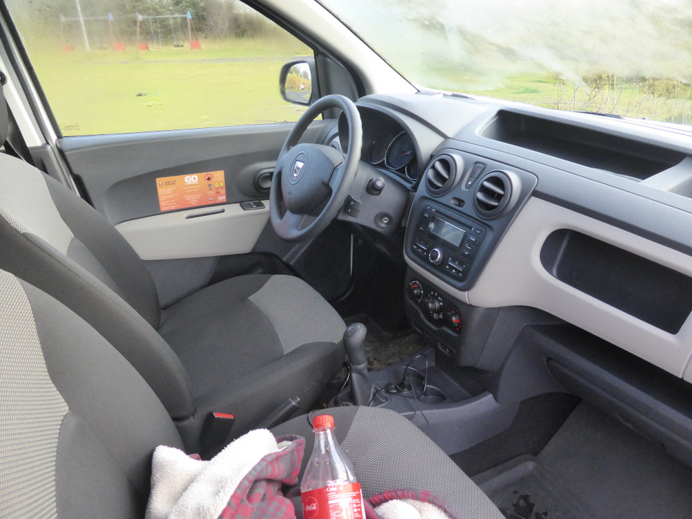 The front of my car - actually my campervan. There's a bottle of Coke and a hoodie visible in the passenger seat.