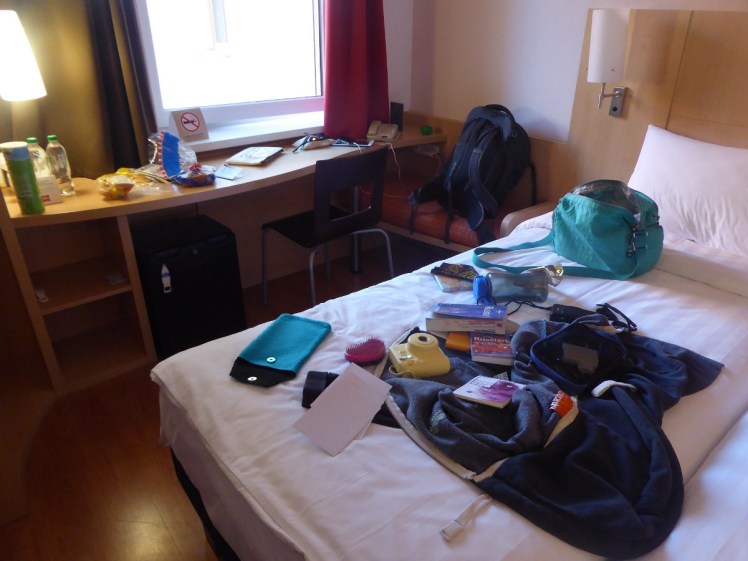 All the smaller bits of my Russia packing spread on a hotel bed