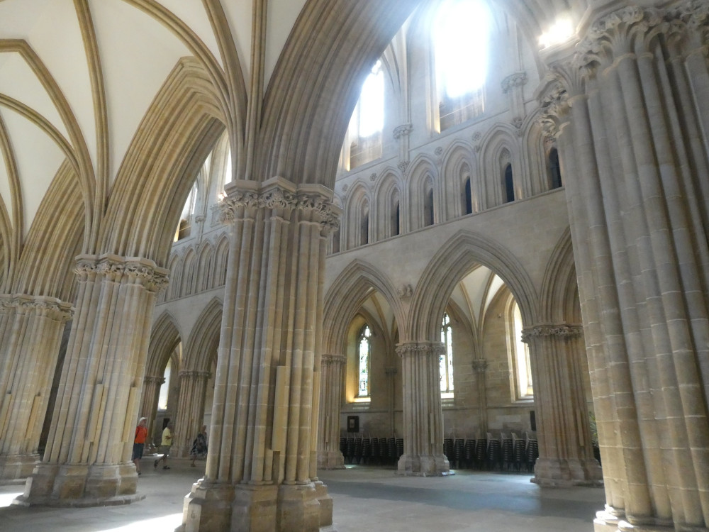 Slender pillars holding up Gothic arches. When you look closely, you realise the slender pillars are just carved onto the outside of stone pillars that are actually thicker than ancient tree trunks.