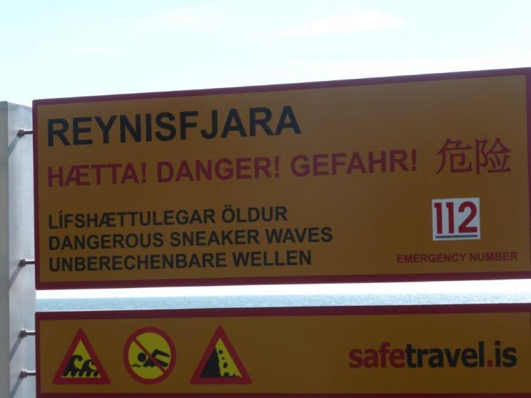 Sneaker waves warning signs at Reynisfjara