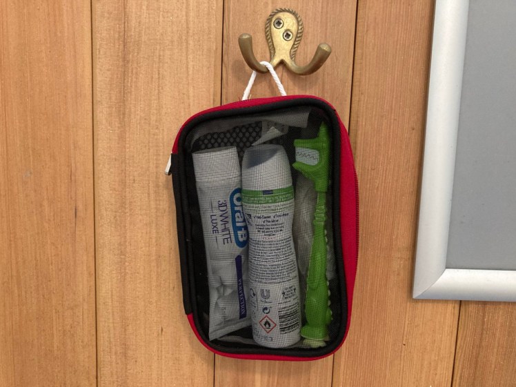 My packing cube washbag hanging from a hook by a new loop I sewed onto it