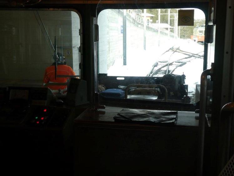 Suitcases in the tray on the front of the Murren train