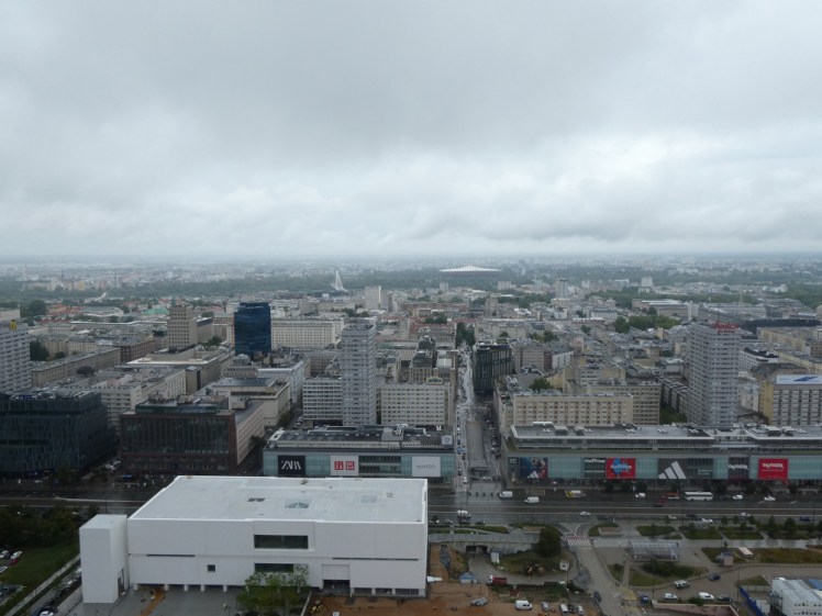 Another view over the city, this time on urban sprawl and cloud. The national stadium is visible in the distance.