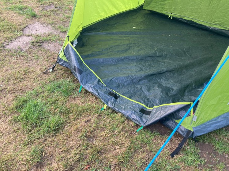 The "front doorstep" of the Sendero 4 with my modifications - extra hoops to hold the front down and extra velcro to hold the door down.