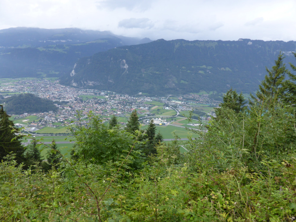 The view of Interlaken from the train as it makes its way up the mountain. Everything is very green but the clouds are getting ominously thick.