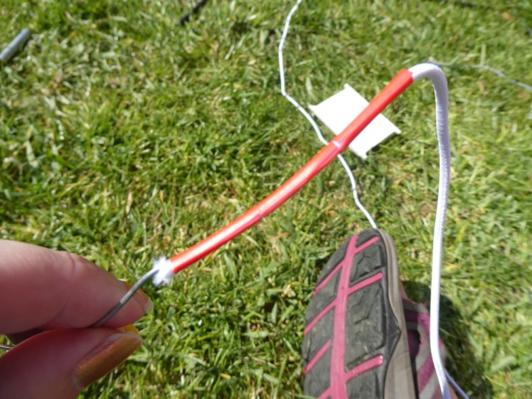 Elastic taped to the threading wire