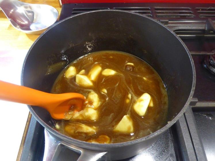 Making flapjack: melting the butter, sugar & syrup