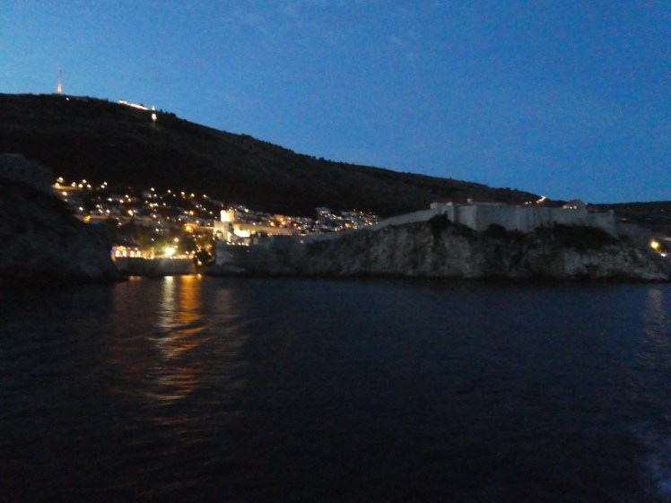 The lights of town reflecting on the water west of the Old Town.