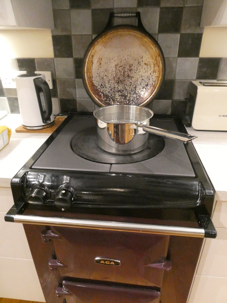 The water sitting on the Aga's hot plate