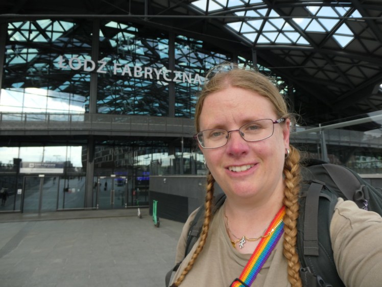 A selfie outside the magnificent glass Łódź Fabryczna station. I'm exactly as tired as I look.
