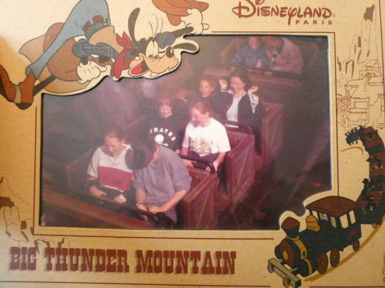 This is the only picture I have of me on this trip. I'm on Big Thunder Mountain at Disneyland Paris, wearing a black pirate t-shirt and apparently cringing away from something. My other best friend, Esther, is next to me in a white t-shirt and giggling. Behind us are James and Tara, two other friends, who also look somewhere between delighted and terrified.