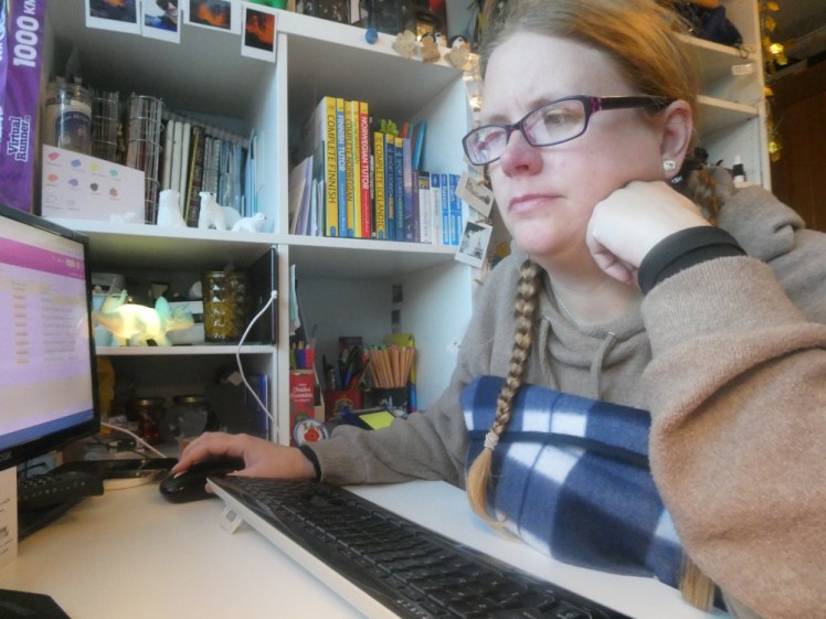 Working at my desk in the afternoon. Now I'm wearing a blue tartan blanket and leaning forward. Clearly I'm straining my eyes more than I realise.