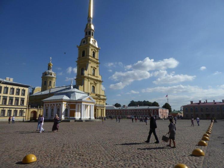 The square in the Peter & Paul Fortress with the boathouse selling tickets & souvenirs in front of the cathedral