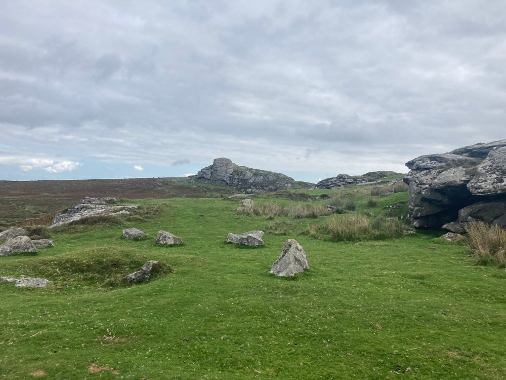 The view from Saddle Tor, complete with granite rocks, across to the great mass of Haytor.