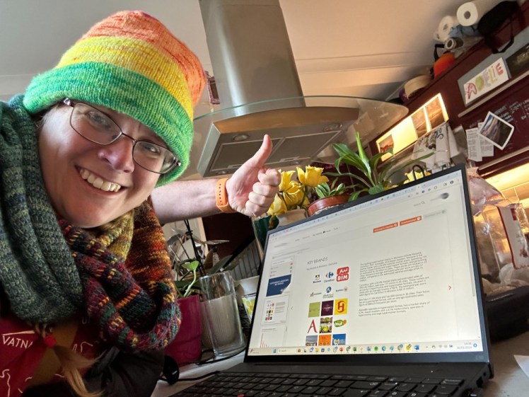 A celebratory day when we published the first report of a huge series. I'm taking a selfie in front of my boss's laptop; he's holding his thumb out behind me. It's not my unusually hairy arm at a really weird angle.