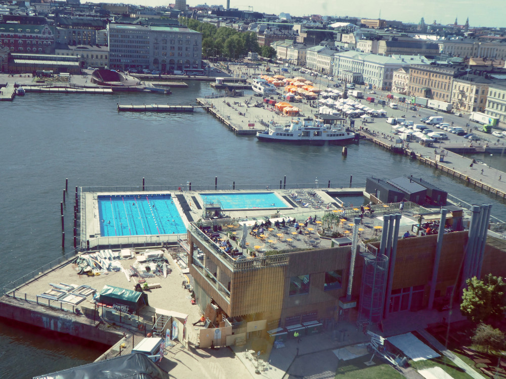 The sea pool and the large rectangular building with the restaurant & viewing platforms as seen from the Sky Wheel. The windows are bright blue so I've attempted, badly, to correct the colours.