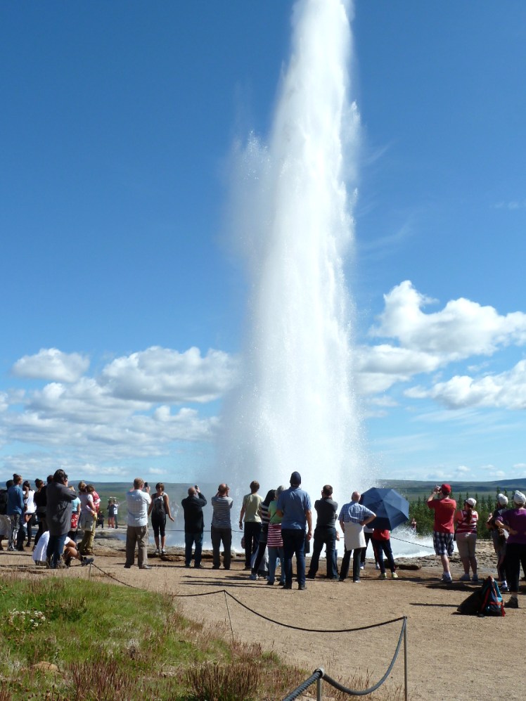 Strokkur erupting, sending a column of boiling water 20m in the air.