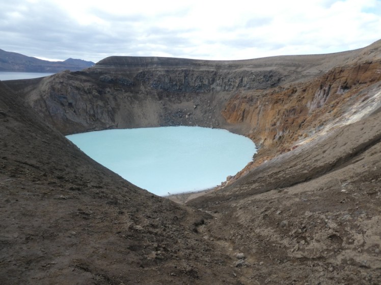 Looking into the steep-sided flooded Viti crater from an opening near the top. From this angle, you just can't see how very steep the scramble is down to the water but let me assure you, it's extremely steep.