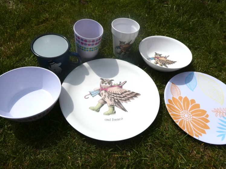 My plates, bowls and cups laid out so you can see how many different patterns, shapes and sizes they are.