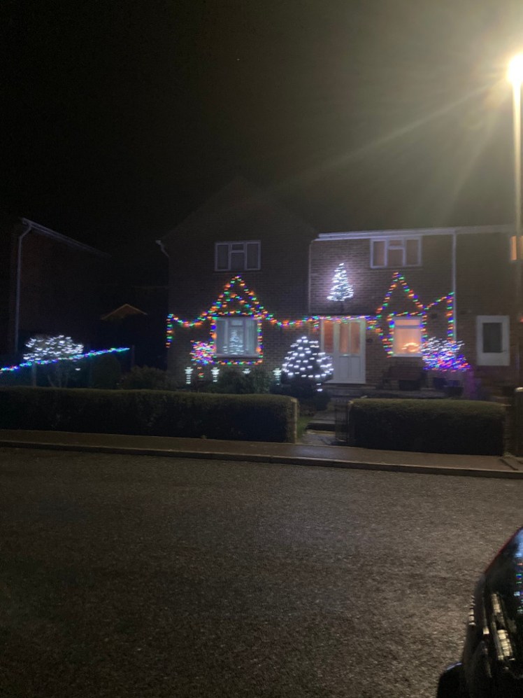 Christmas lights going up along the main road