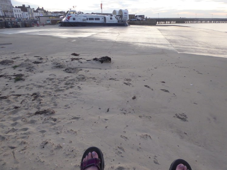 Sitting on the harbour wall overlooking the hoverport