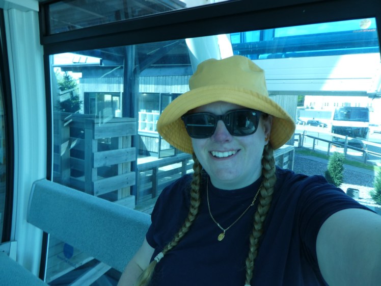 A selfie at the bottom of the wheel as it spins past the disembarkation platform without stopping.