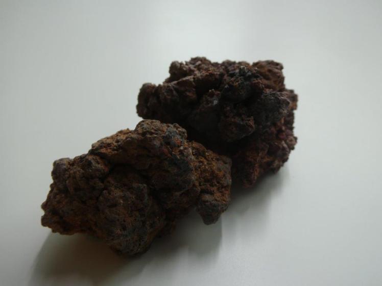 Dark reddish-brown spiky lava rock