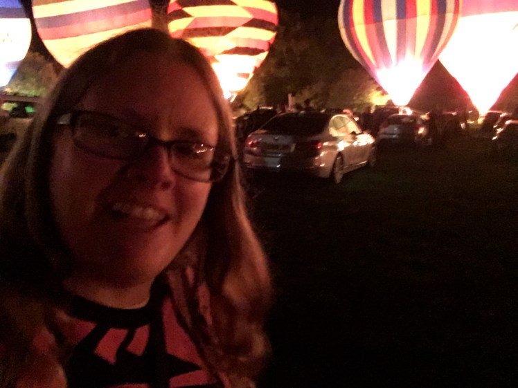 Selfie singing and dancing to the glowing balloons