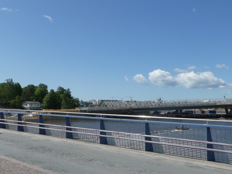 The new bridge project as seen from the temporary bridge over to the zoo island. In the distance, you can just see the spire of Helsinki Cathedral.
