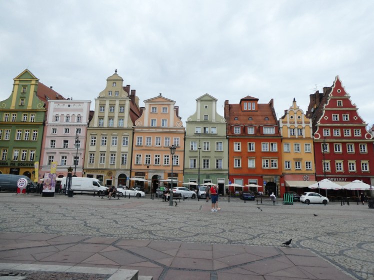 Plac Solny, the Salt Square off Stary Rynek in Wrocław. It's a smaller square but more of the same tall colourful warehouse-like buildings.