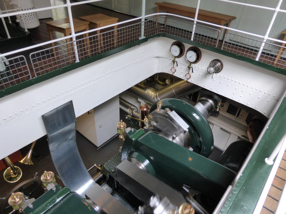 The boat's steam engine, a mass of green-painted, steel and brass pistons and whatnot.